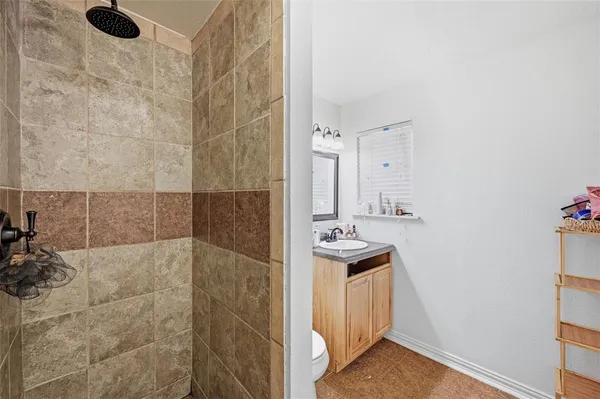 a bathroom with a sink and mirror