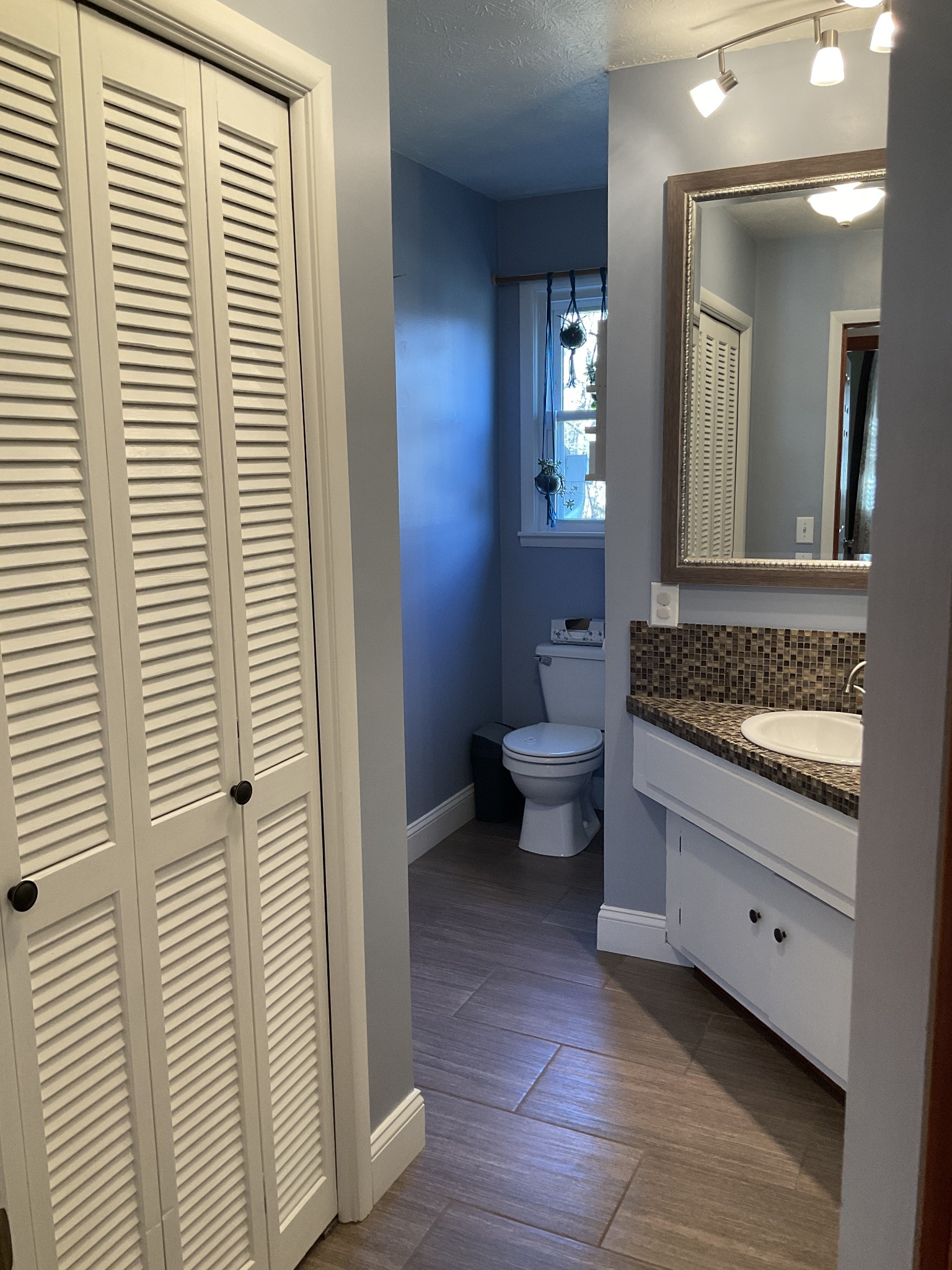 229 Black Road Dickson, TN 37055 - Photo 15 of 34 a bathroom with a granite countertop sink and a mirror