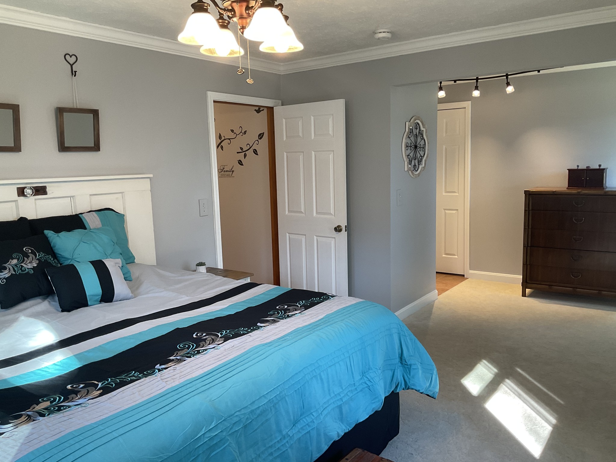 229 Black Road Dickson, TN 37055 - Photo 17 of 34 a bedroom with furniture and a fireplace