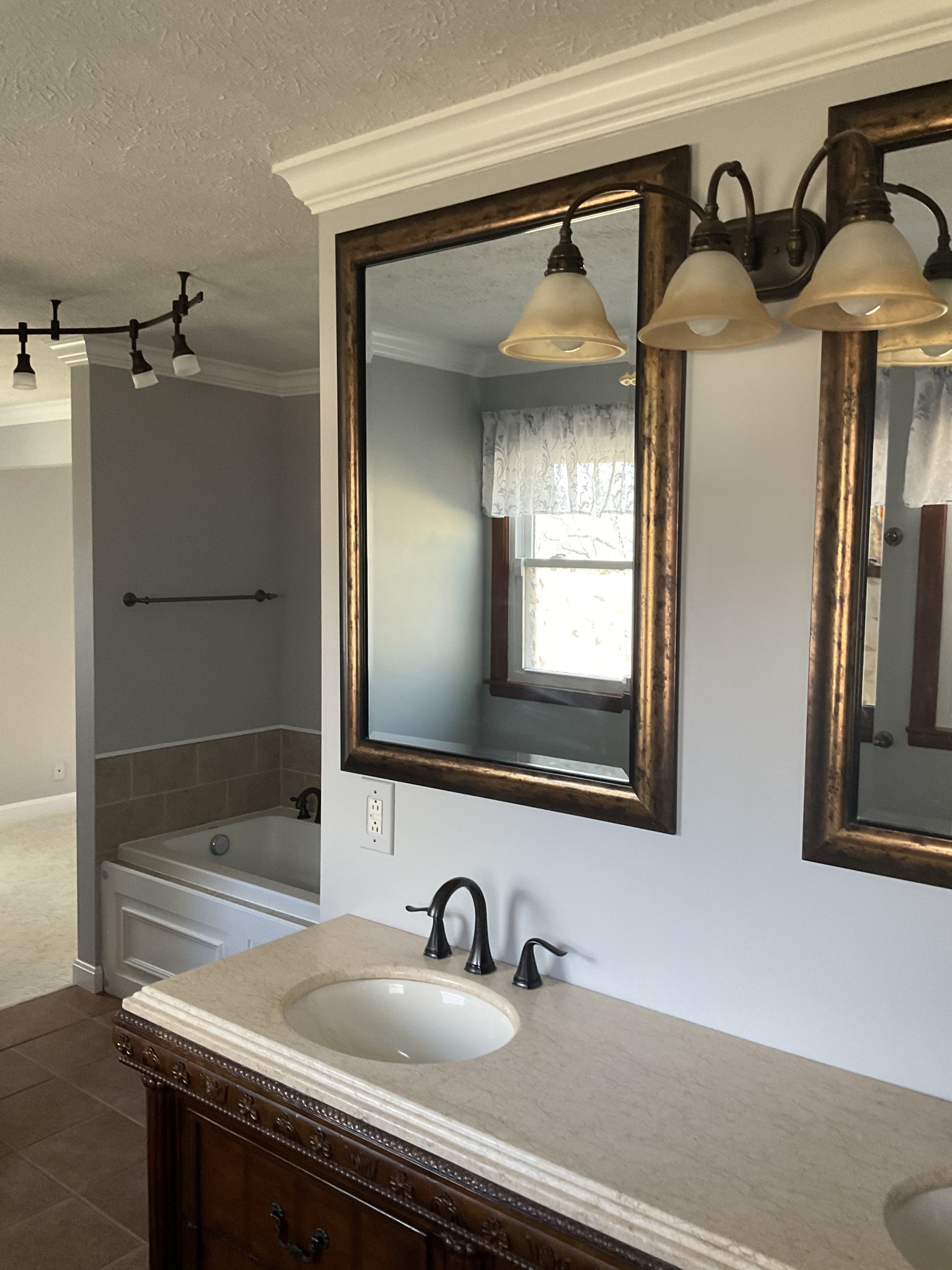 229 Black Road Dickson, TN 37055 - Photo 19 of 34 a bathroom with a sink and a mirror