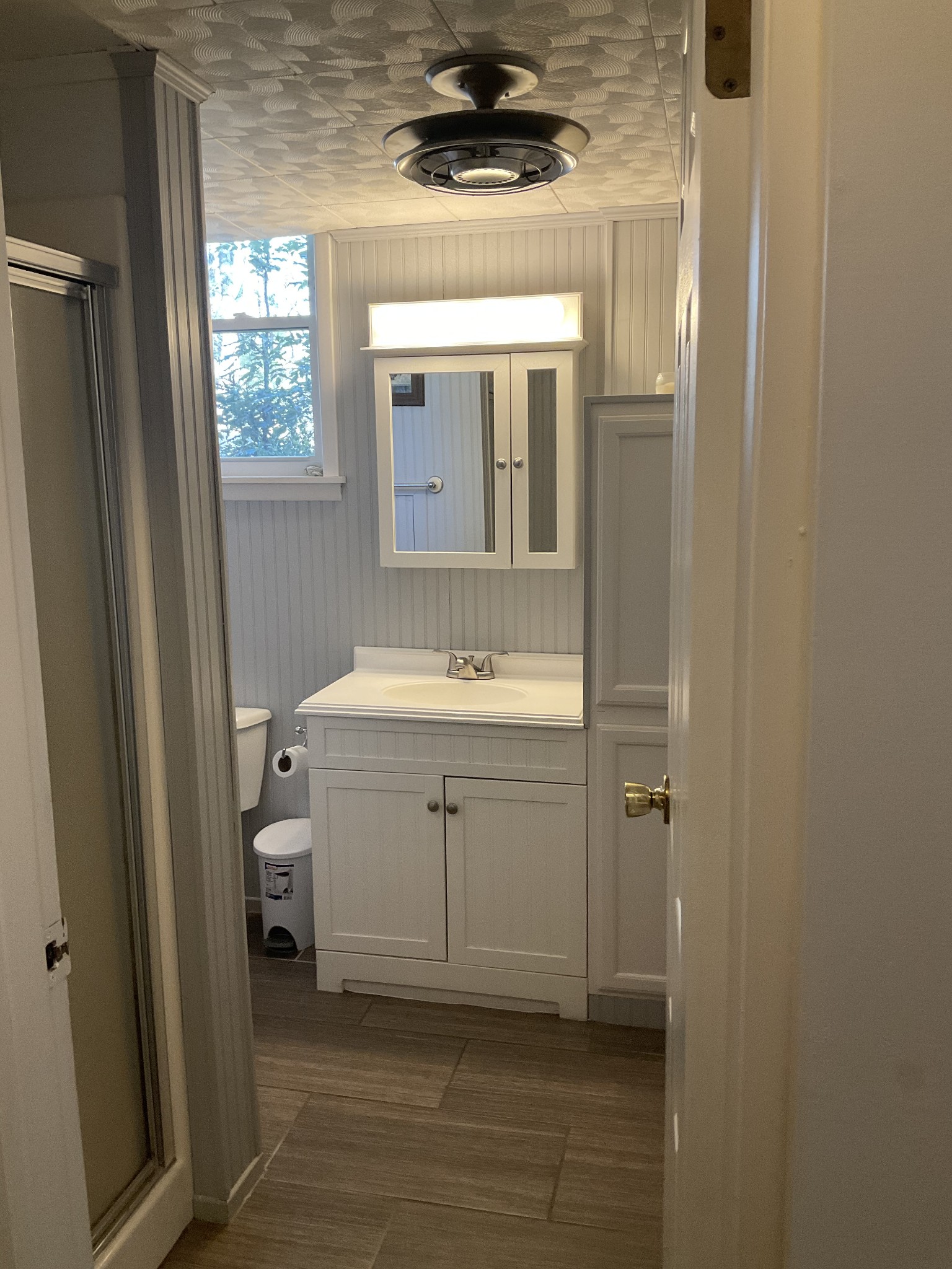 229 Black Road Dickson, TN 37055 - Photo 22 of 34 a bathroom with a sink a mirror and a window