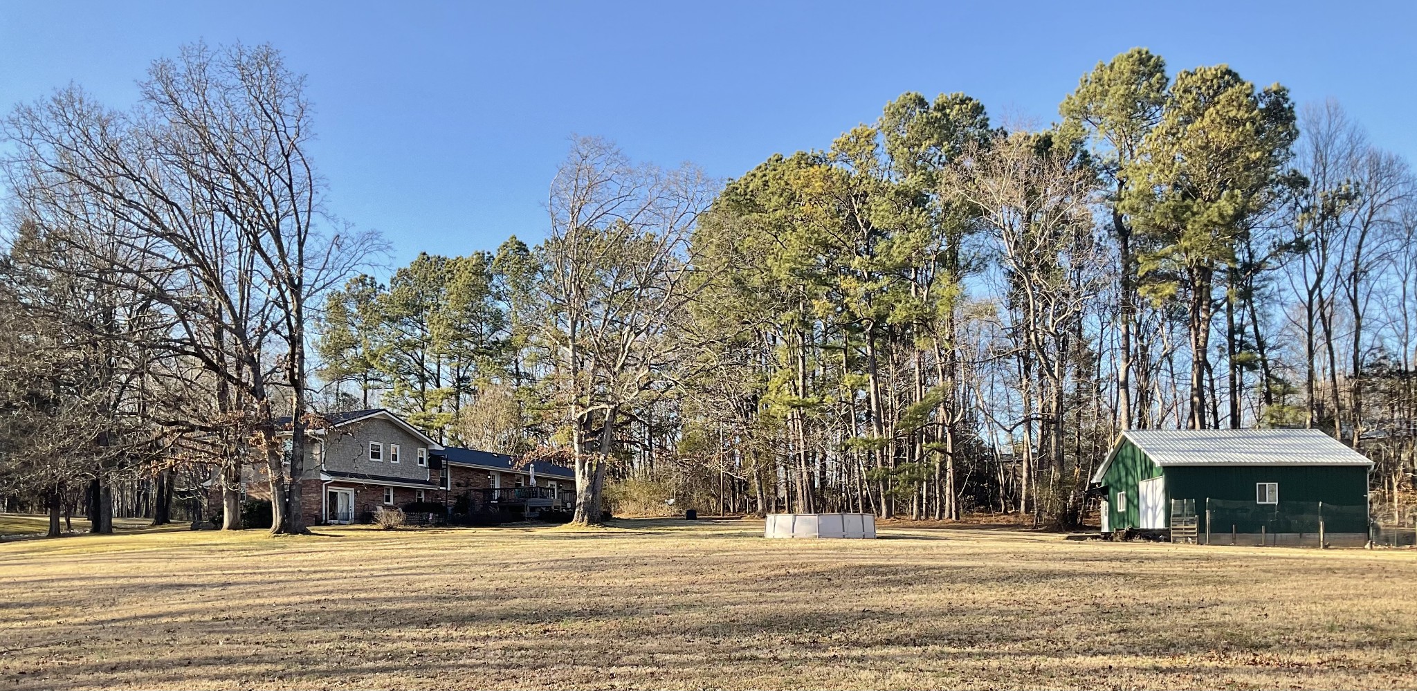 229 Black Road Dickson, TN 37055 - Photo 33 of 34 a front view of a building with large trees