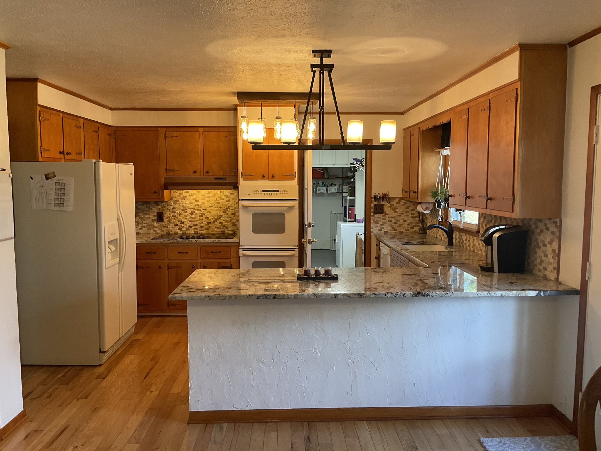 229 Black Road Dickson, TN 37055 - Photo 8 of 34 a kitchen with stainless steel appliances granite countertop a refrigerator a stove and a sink