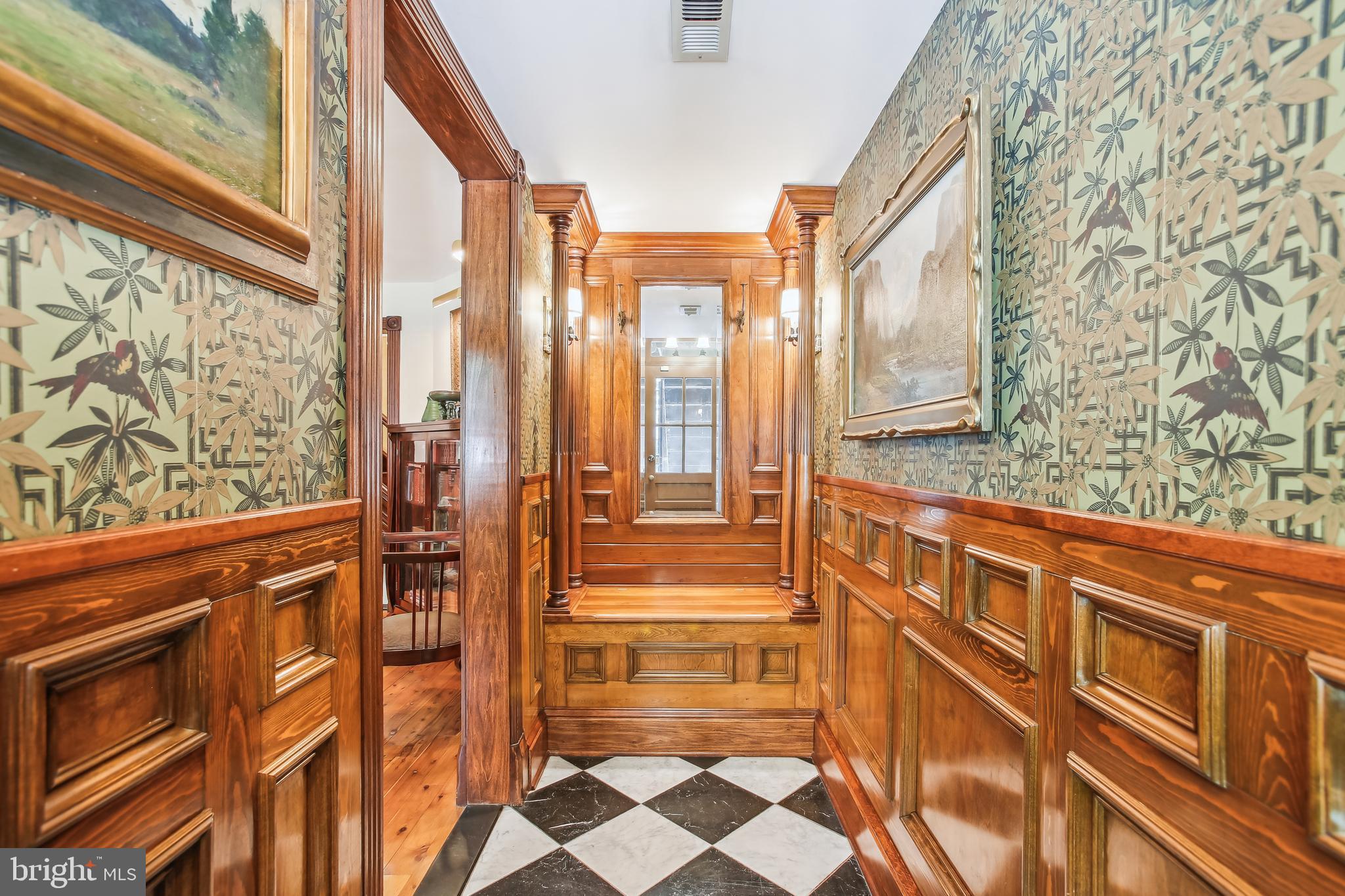 1252 10th Street Northwest Washington, DC 20001 - Photo 29 of 58 Marble floor, wainscoting, and chair box welcome