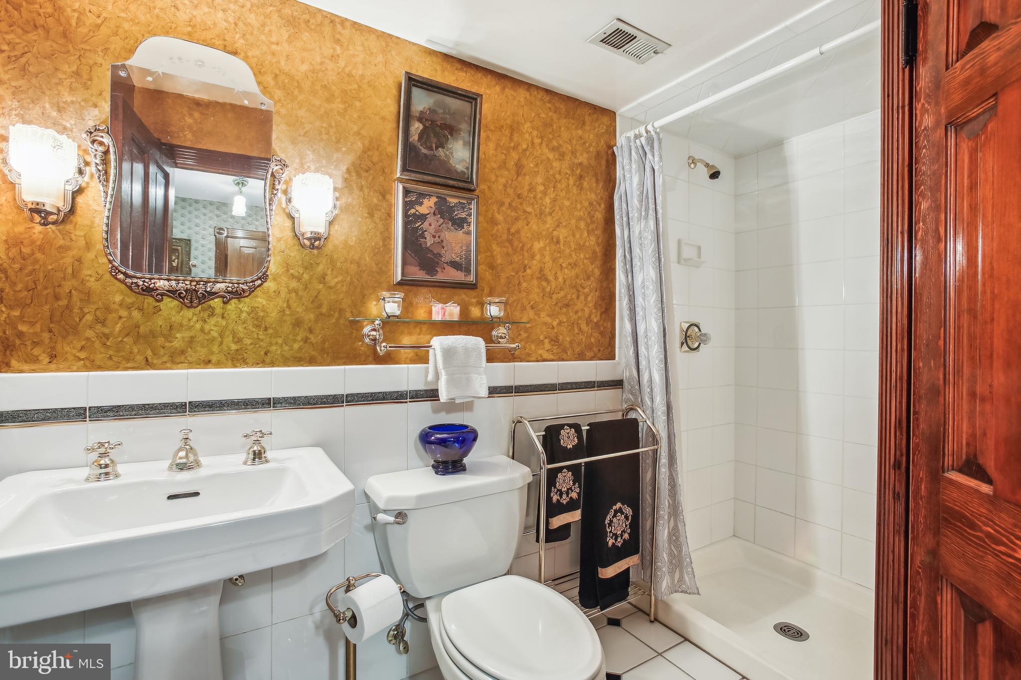 1252 10th Street Northwest Washington, DC 20001 - Photo 42 of 58 Lower Level Full Bath with Shower. Gold leaf Walls