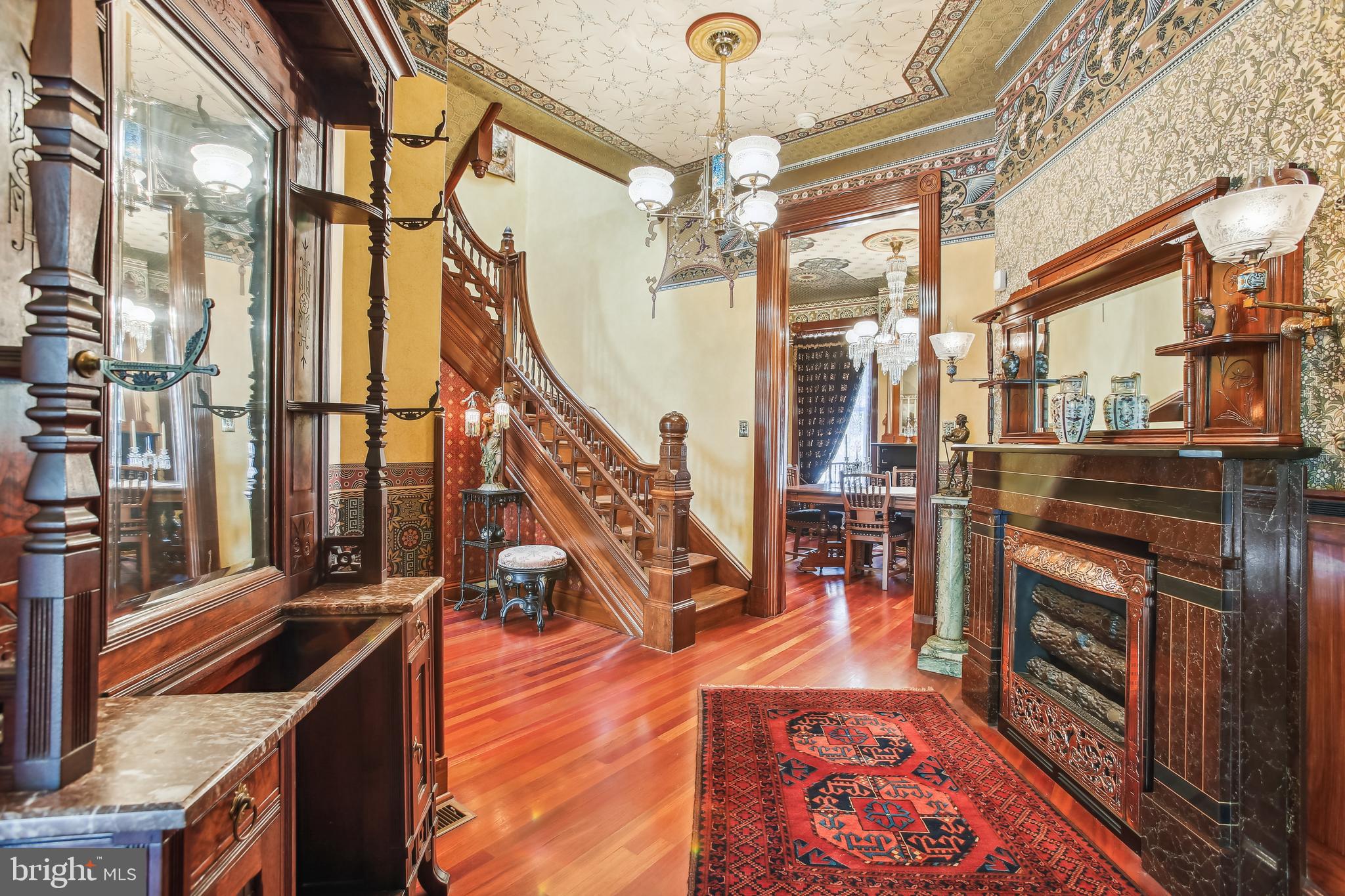 1252 10th Street Northwest Washington, DC 20001 - Photo 9 of 58 Stunning Hallway. Staircase includes carved fans.