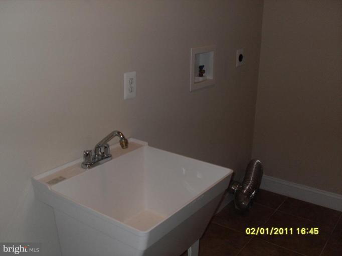 4017 Brummel Road Pasadena, MD 21122 - Photo 22 of 30 Laundry Area 1
