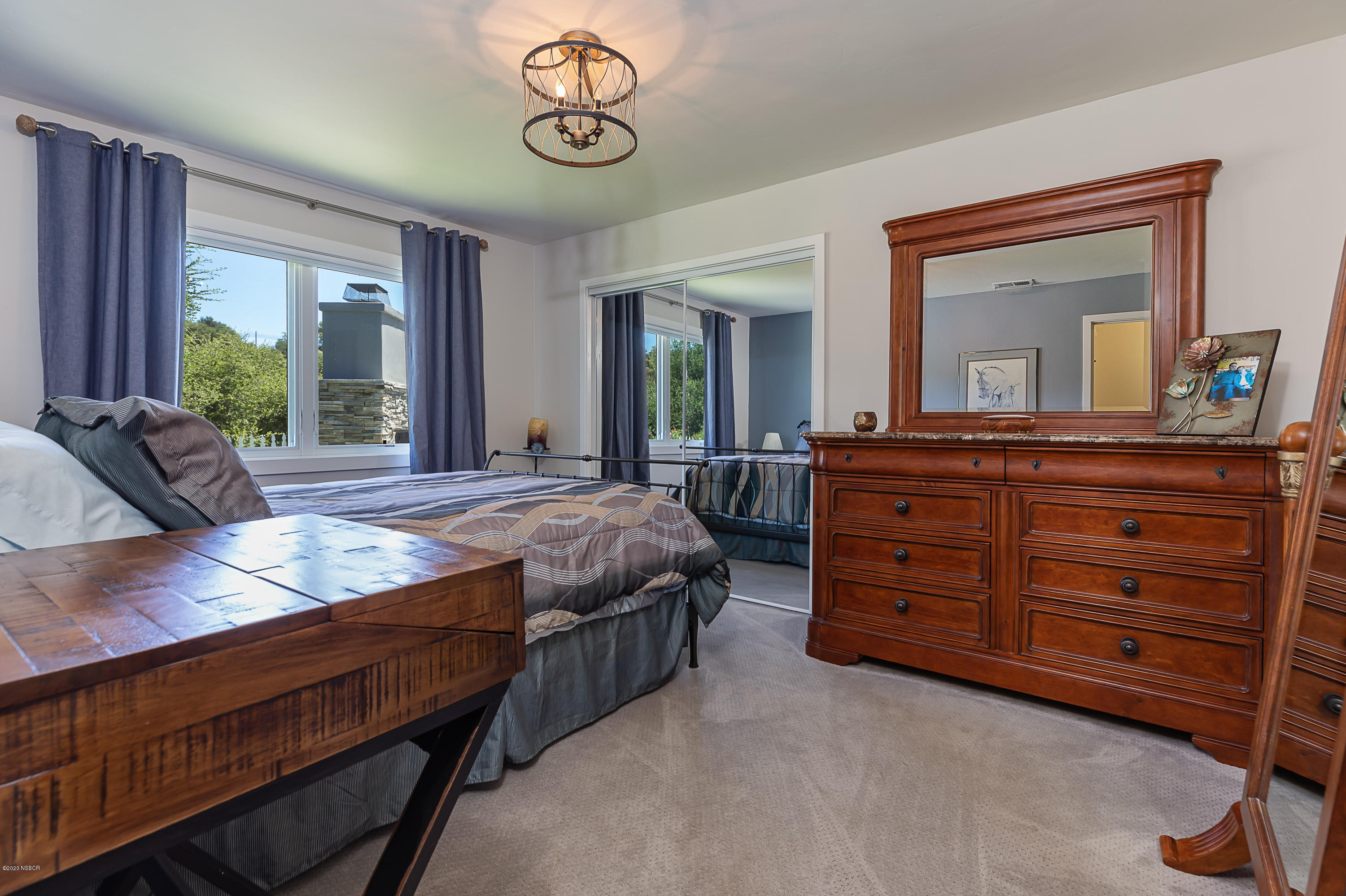 2550 Elk Grove Road Solvang, CA 93463 - Photo 14 of 28 a living room with furniture and a large window