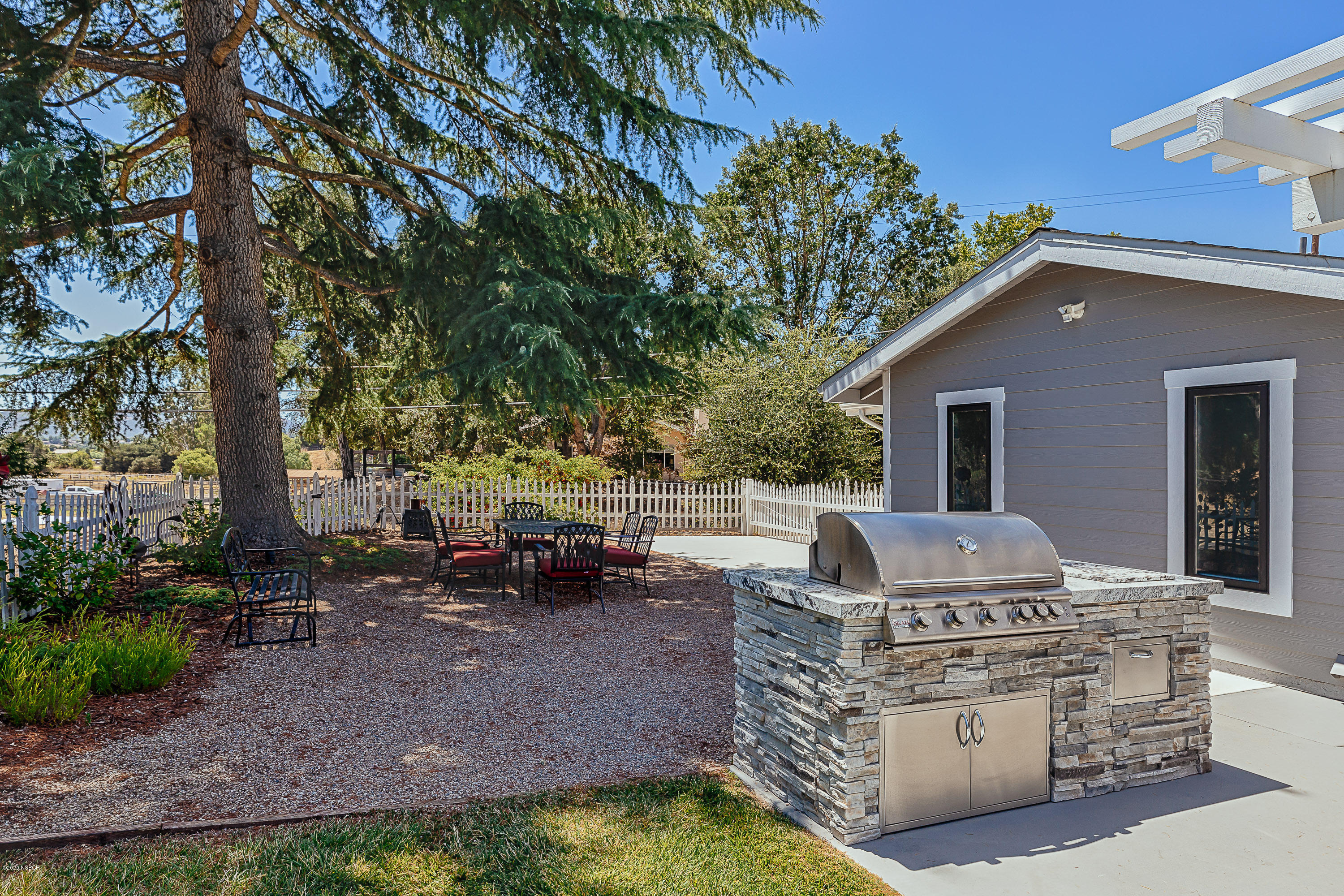 2550 Elk Grove Road Solvang, CA 93463 - Photo 19 of 28 a view of a house with backyard sofas and sitting area