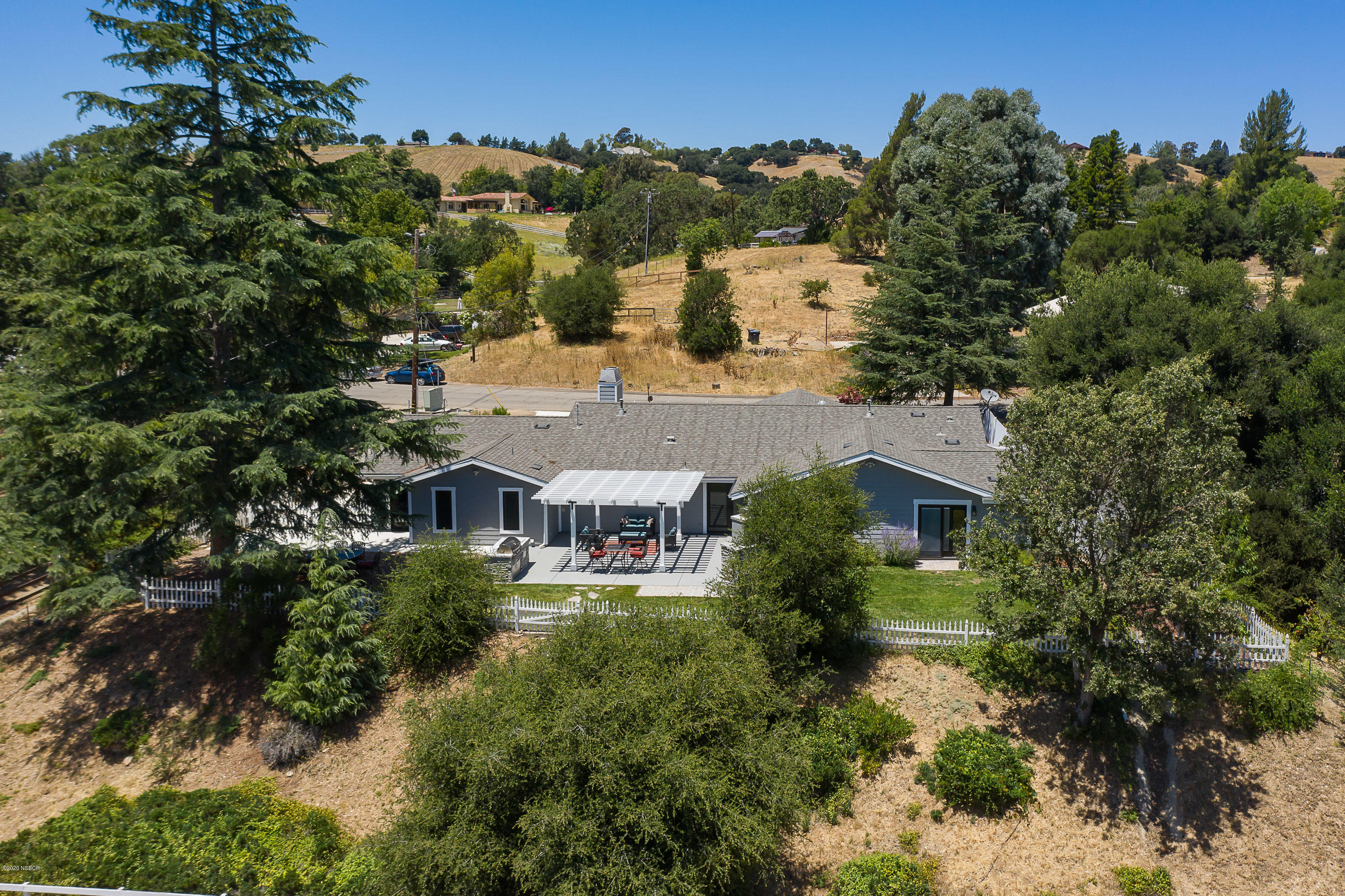 2550 Elk Grove Road Solvang, CA 93463 - Photo 28 of 28 an aerial view of residential houses with outdoor space and trees