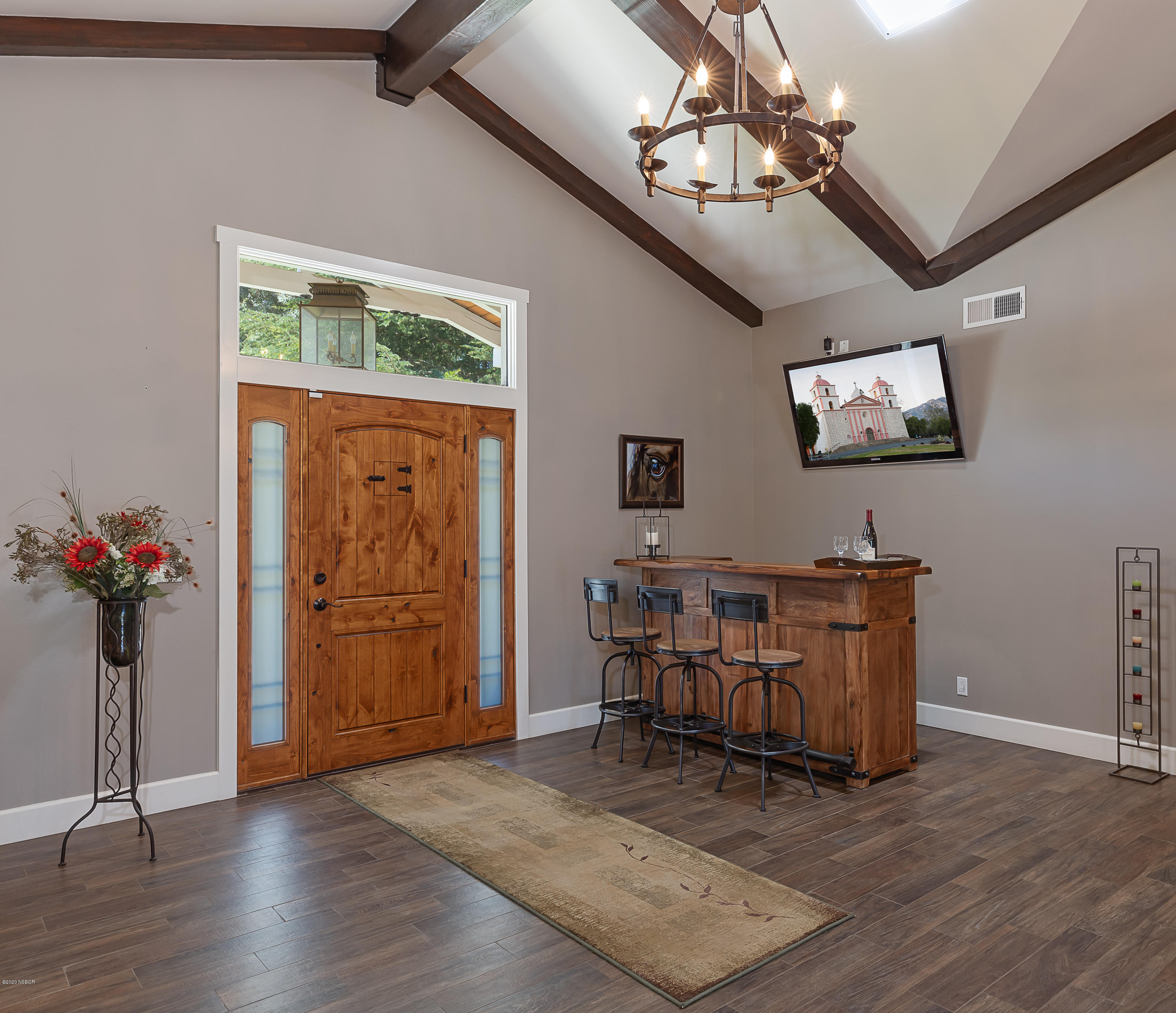 2550 Elk Grove Road Solvang, CA 93463 - Photo 9 of 28 a view of a livingroom with furniture wooden floor and a chandelier