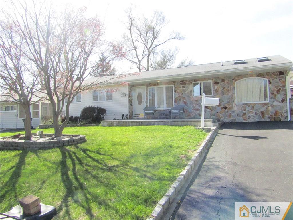 25 Brandeis Road Old Bridge, NJ 08859 - Photo 15 of 25 a front view of a house with garden