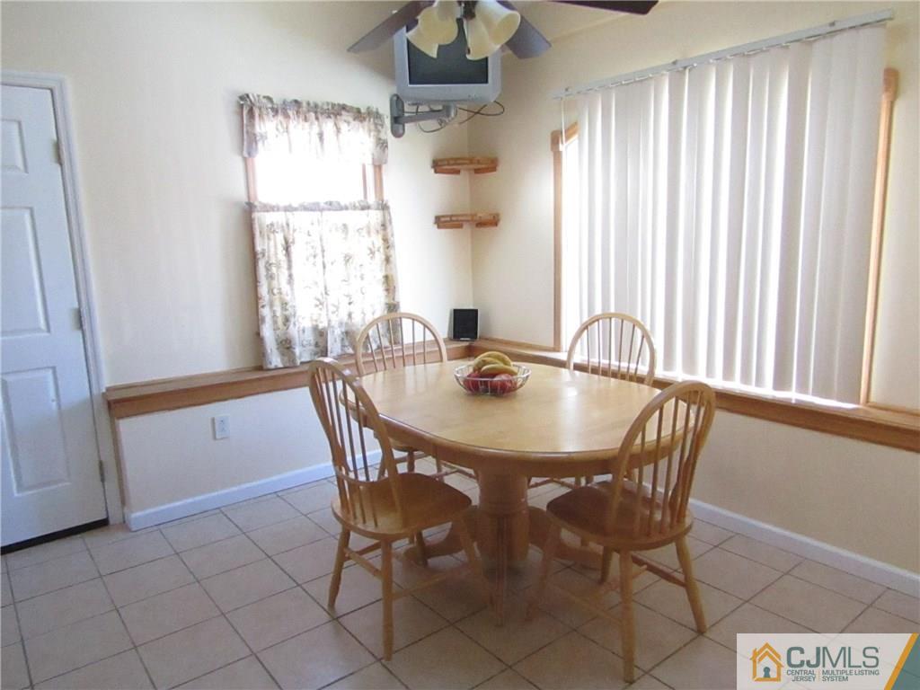 25 Brandeis Road Old Bridge, NJ 08859 - Photo 5 of 25 a view of a dining room with furniture and window