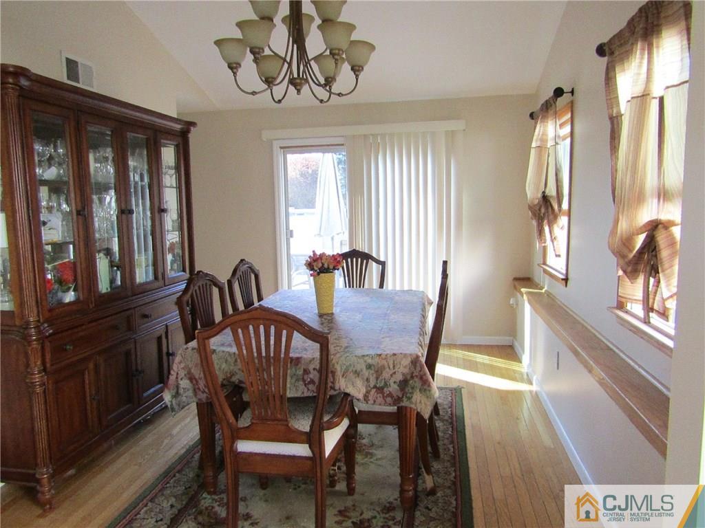 25 Brandeis Road Old Bridge, NJ 08859 - Photo 6 of 25 a view of a dining room with furniture window and wooden floor