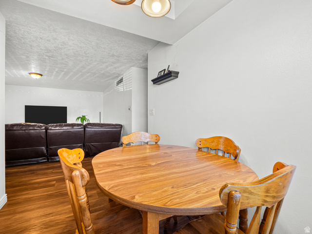 460 200 South Provo, UT 84606 - Photo 44 of 66 Dining space with wood finished floors and a textured ceiling