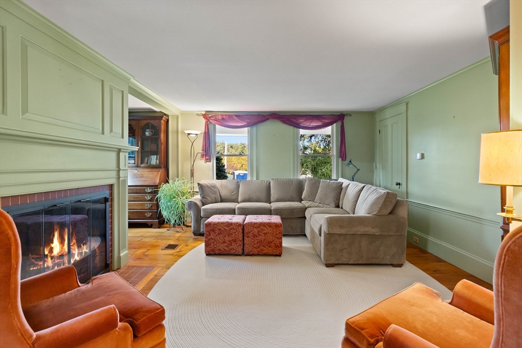 63 Ferry Road Salisbury, MA 01952 - Photo 14 of 42 a living room with furniture and a fireplace