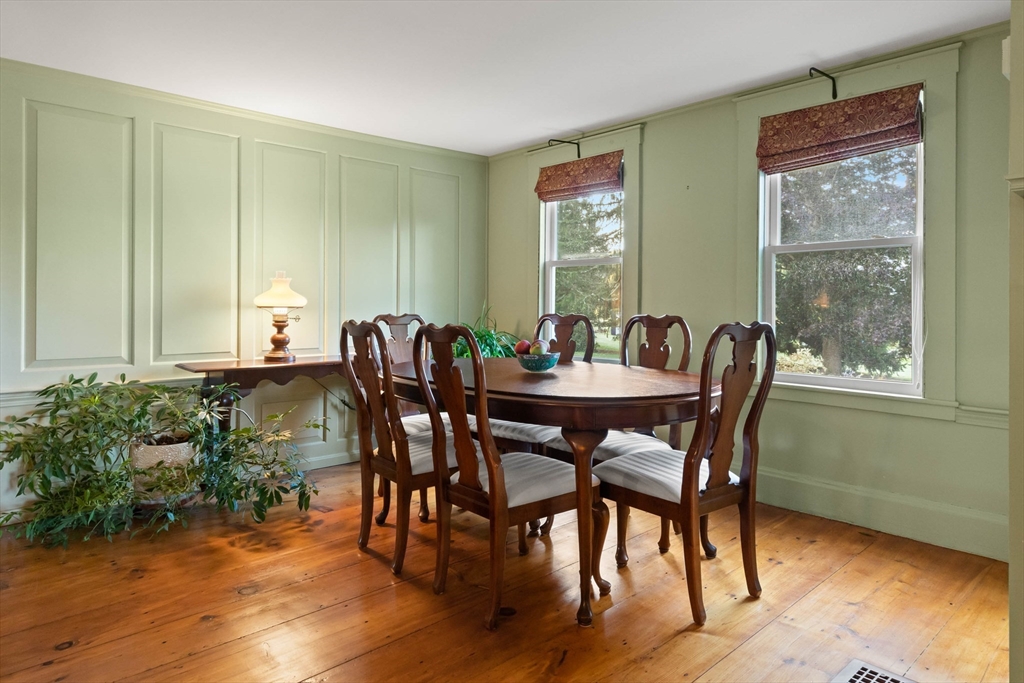 63 Ferry Road Salisbury, MA 01952 - Photo 17 of 42 a view of a dining room with furniture window and wooden floor