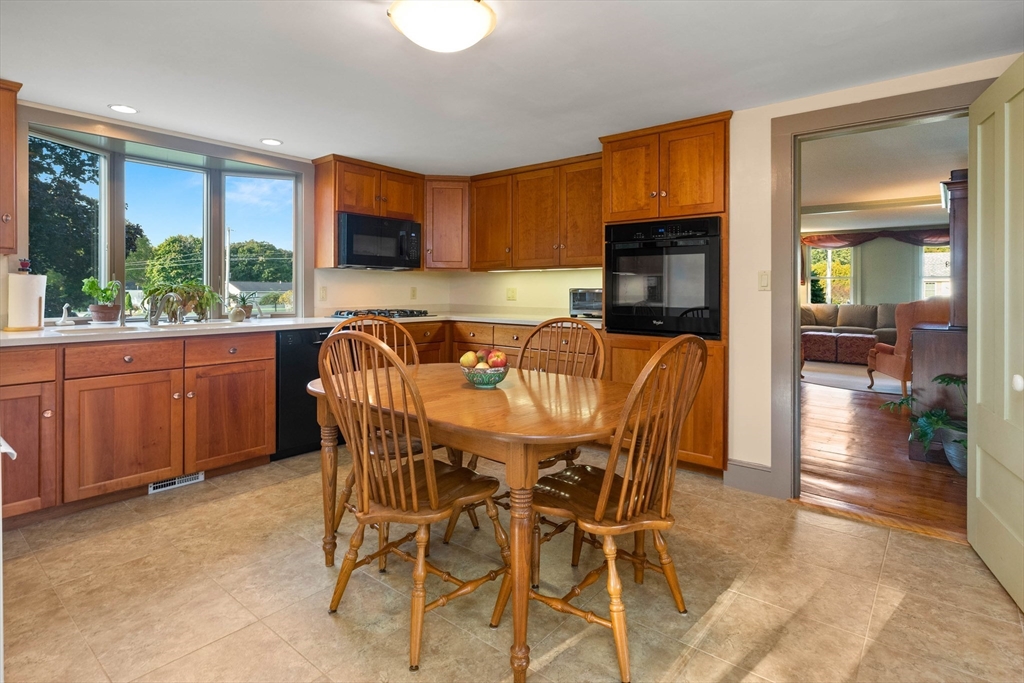63 Ferry Road Salisbury, MA 01952 - Photo 19 of 42 a view of a dining room with furniture window and outside view