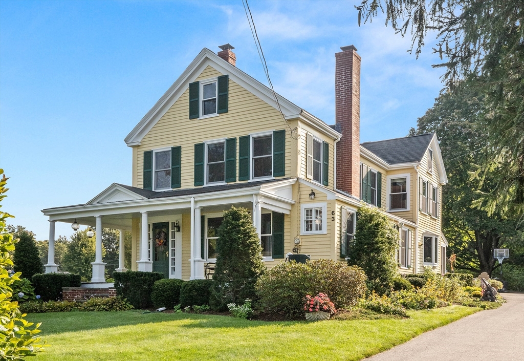 63 Ferry Road Salisbury, MA 01952 - Photo 2 of 42 a front view of a house with yard and green space