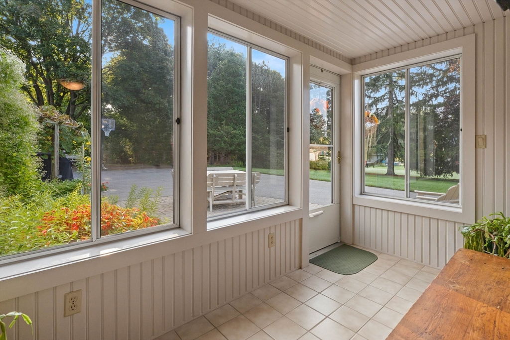 63 Ferry Road Salisbury, MA 01952 - Photo 23 of 42 a bathroom with a sink and glass door