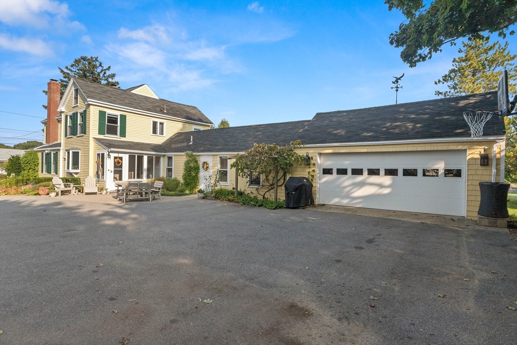 63 Ferry Road Salisbury, MA 01952 - Photo 8 of 42 front view of a house with a street