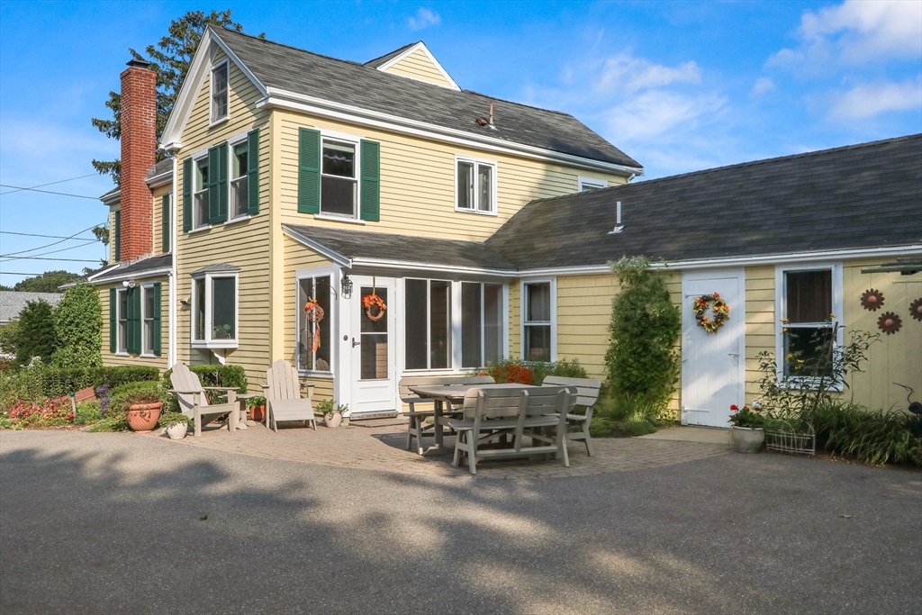 63 Ferry Road Salisbury, MA 01952 - Photo 9 of 42 a view of a house with a patio
