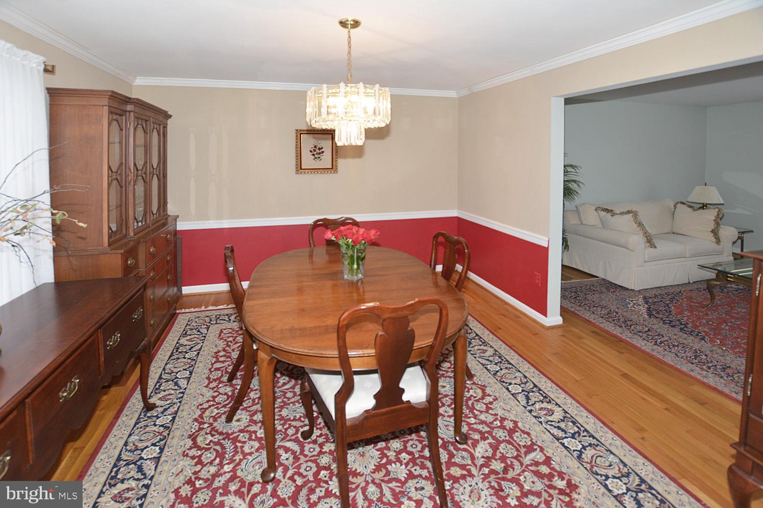 6906 Spur Road Springfield, VA 22153 - Photo 16 of 28 a view of a dining room with furniture