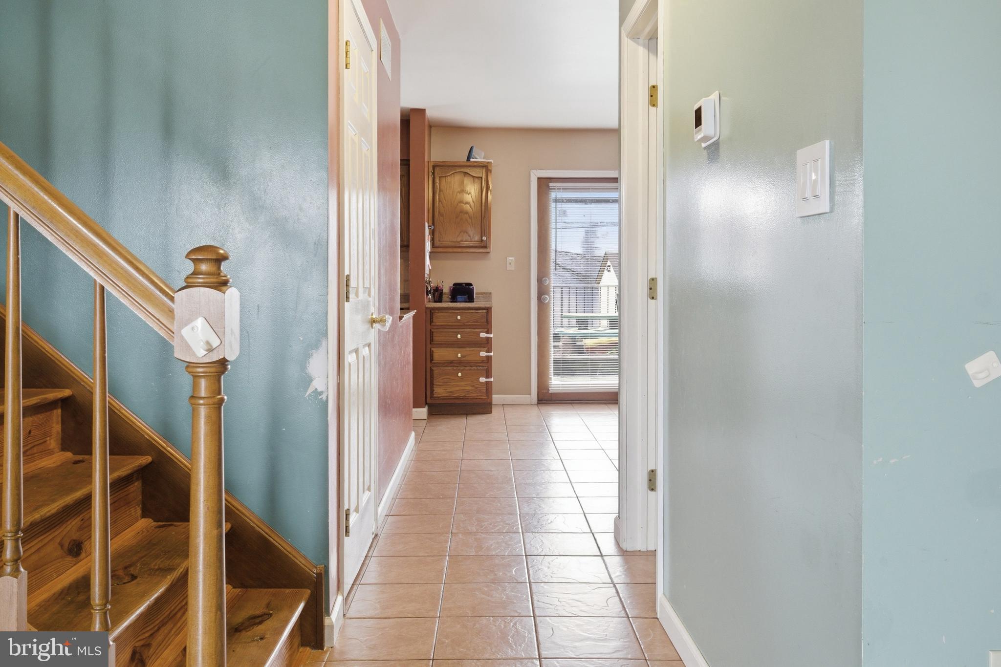 1302 Carbon Street Reading, PA 19601 - Photo 6 of 24 a view of a hallway with a white walls