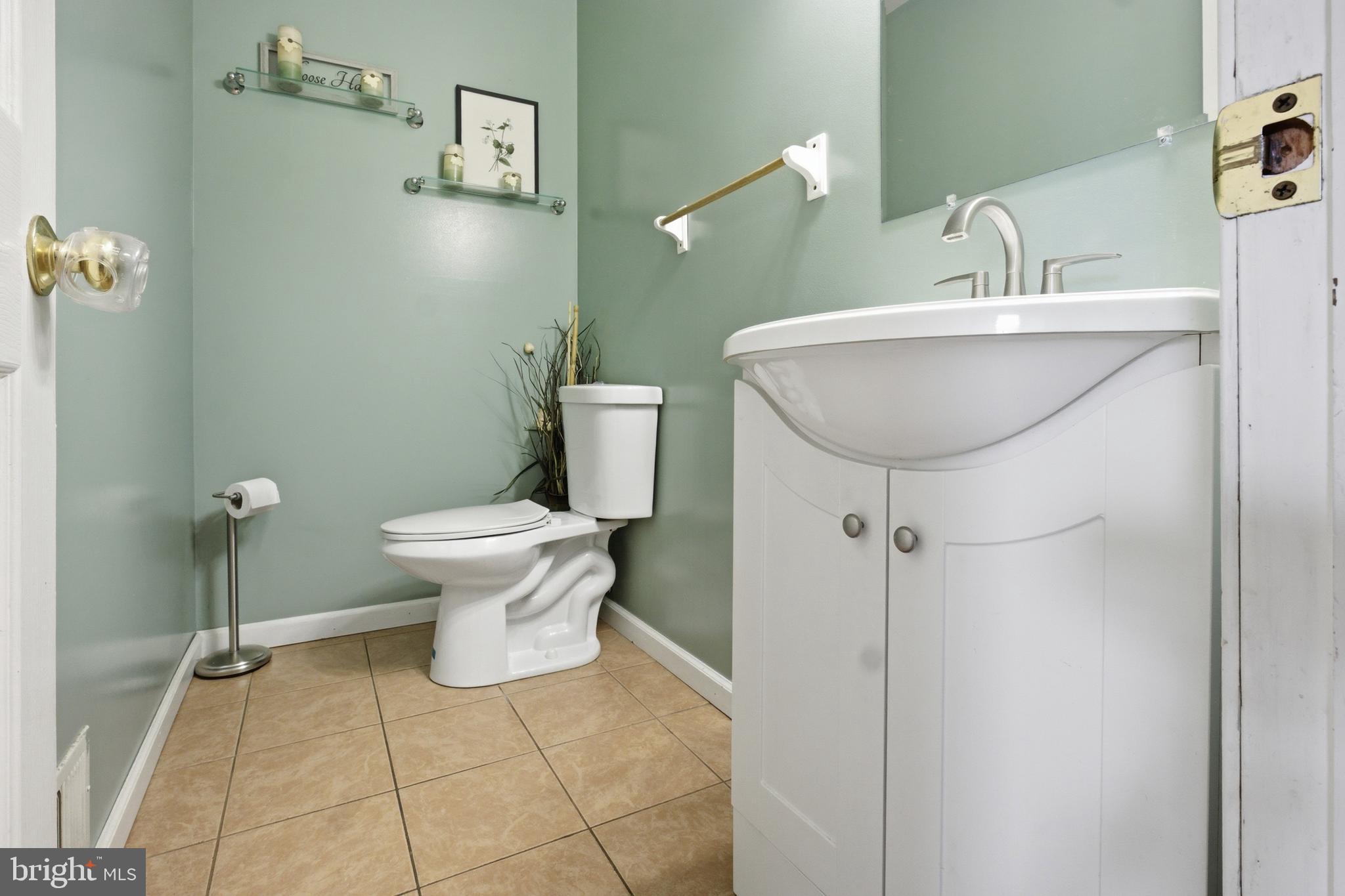 1302 Carbon Street Reading, PA 19601 - Photo 7 of 24 a bathroom with a sink toilet and shower