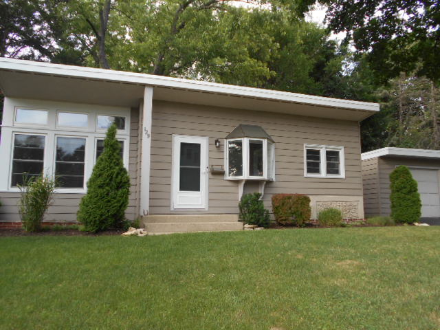 129 Oak Street Geneva, IL 60134 - Photo 2 of 2 a view of a house with a yard