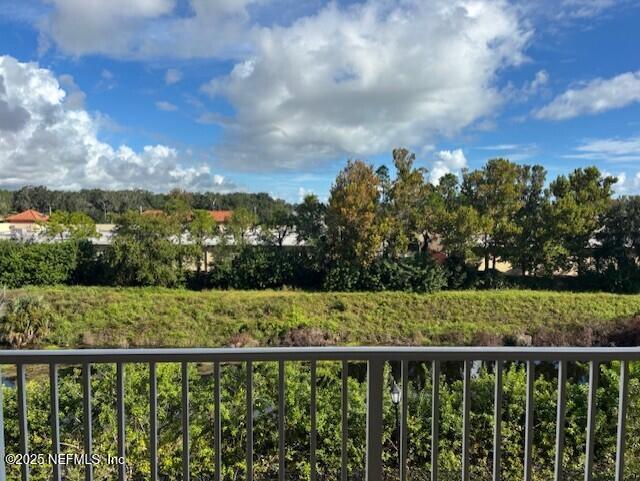 a view of a garden and trees