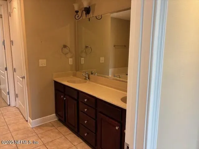 a spacious bathroom with a bathtub and a shower