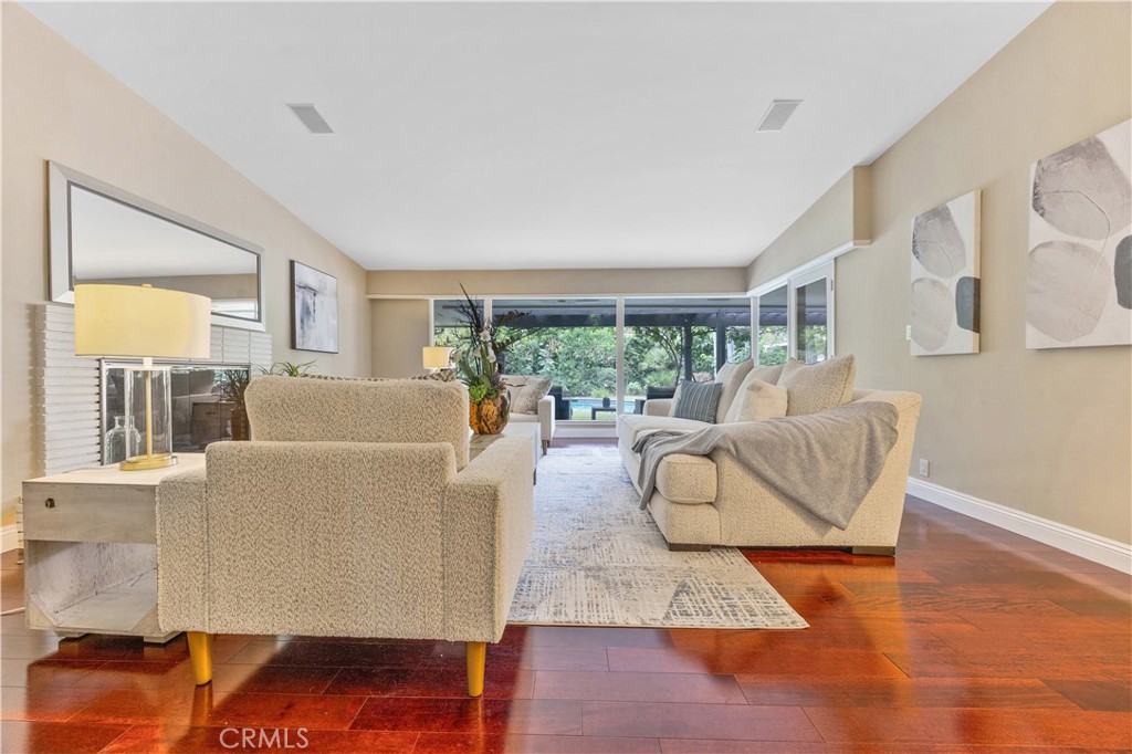 1439 Wembley Road San Marino, CA 91108 - Photo 7 of 45 a living room with furniture and a large window