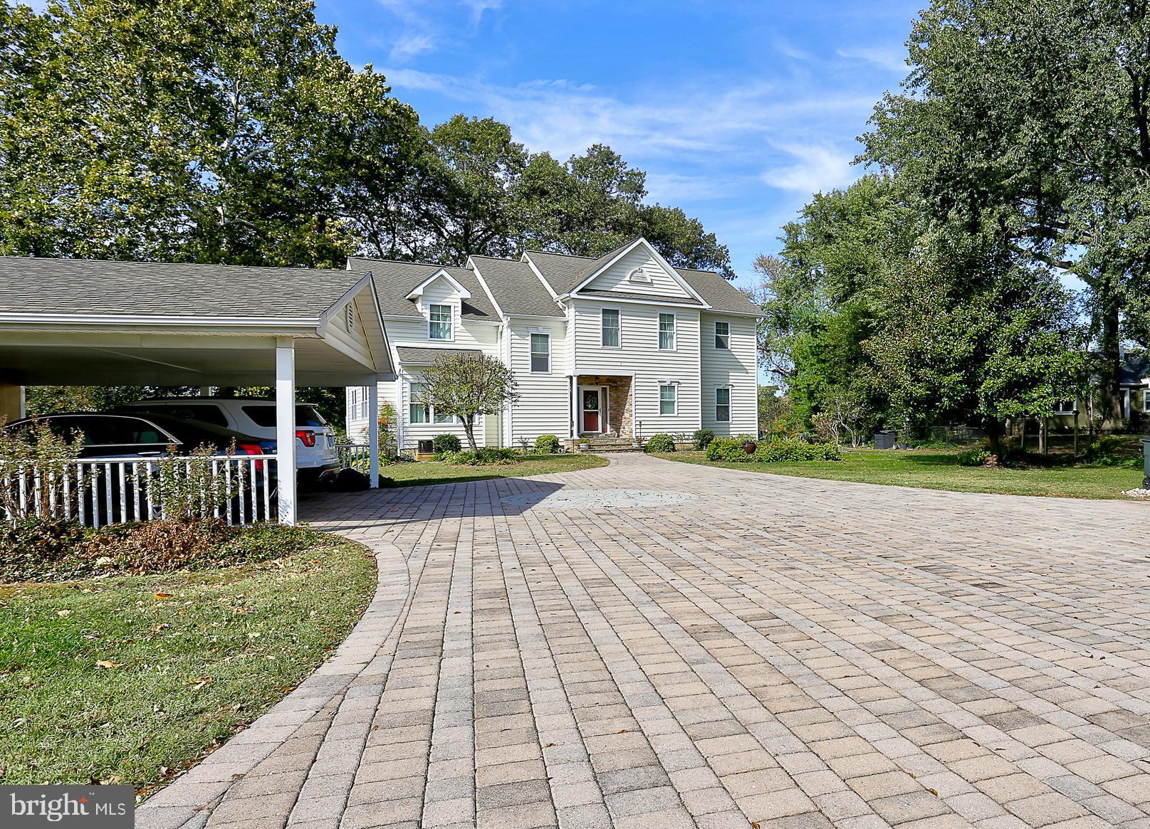 2108 Poplar Ridge Road Pasadena, MD 21122 - Photo 4 of 15 2 car carport and pavered driveway