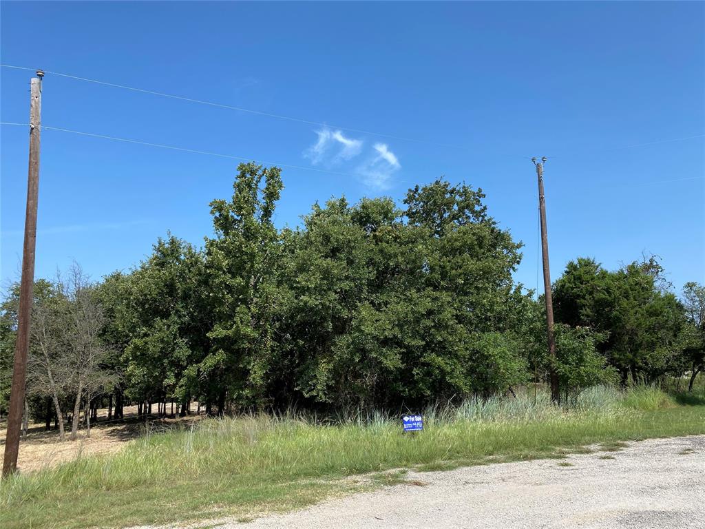 a view of a lake with a house in background