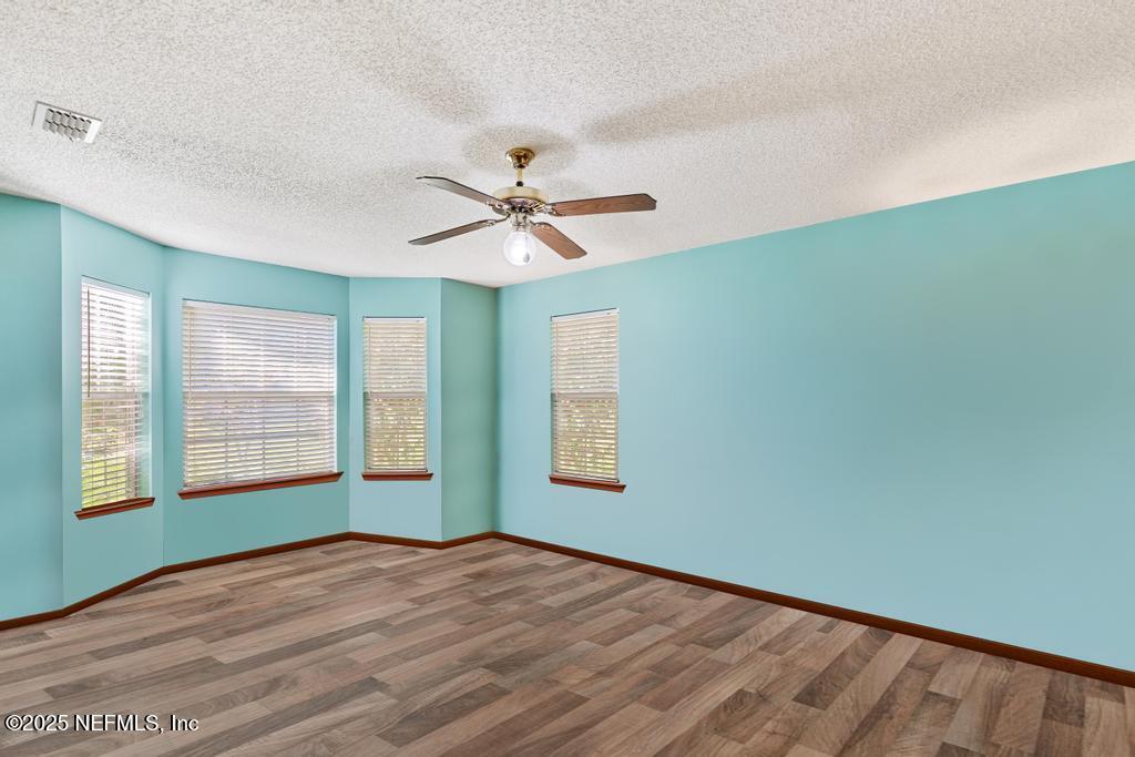 45235 Stratton Road Callahan, FL 32011 - Photo 14 of 44 a view of an empty room with a window