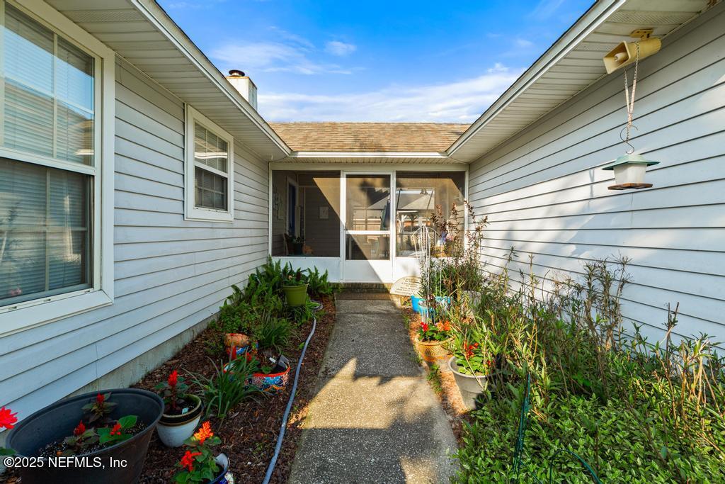 45235 Stratton Road Callahan, FL 32011 - Photo 30 of 44 a front view of a house with a yard