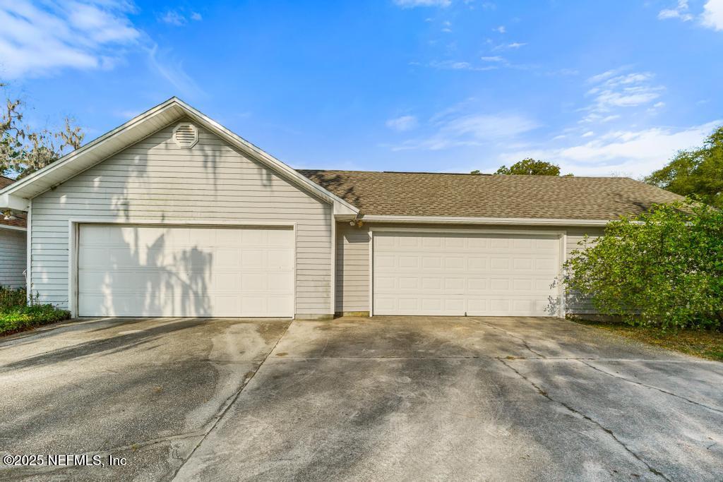 45235 Stratton Road Callahan, FL 32011 - Photo 38 of 44 a view of garage and yard