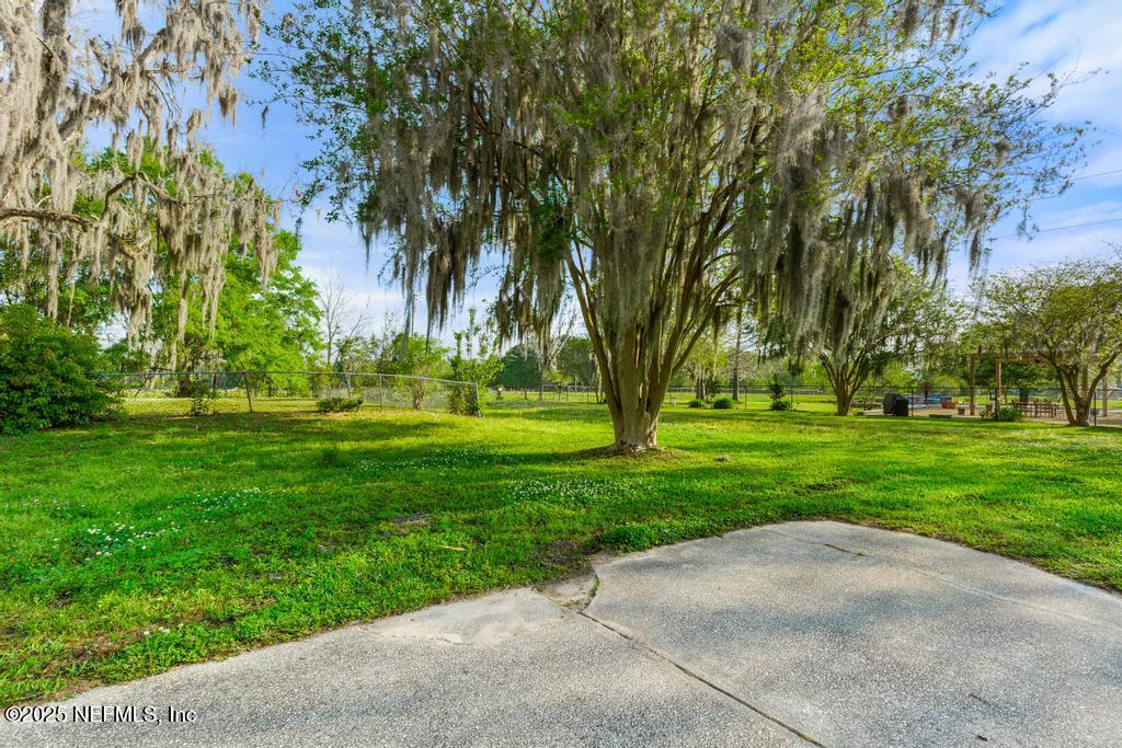 45235 Stratton Road Callahan, FL 32011 - Photo 39 of 44 a huge green field with lots of trees