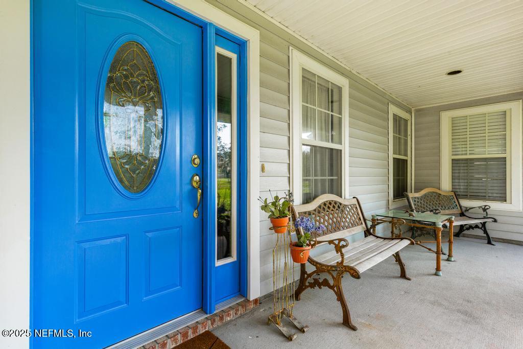 45235 Stratton Road Callahan, FL 32011 - Photo 9 of 44 a view of a livingroom with furniture and a window