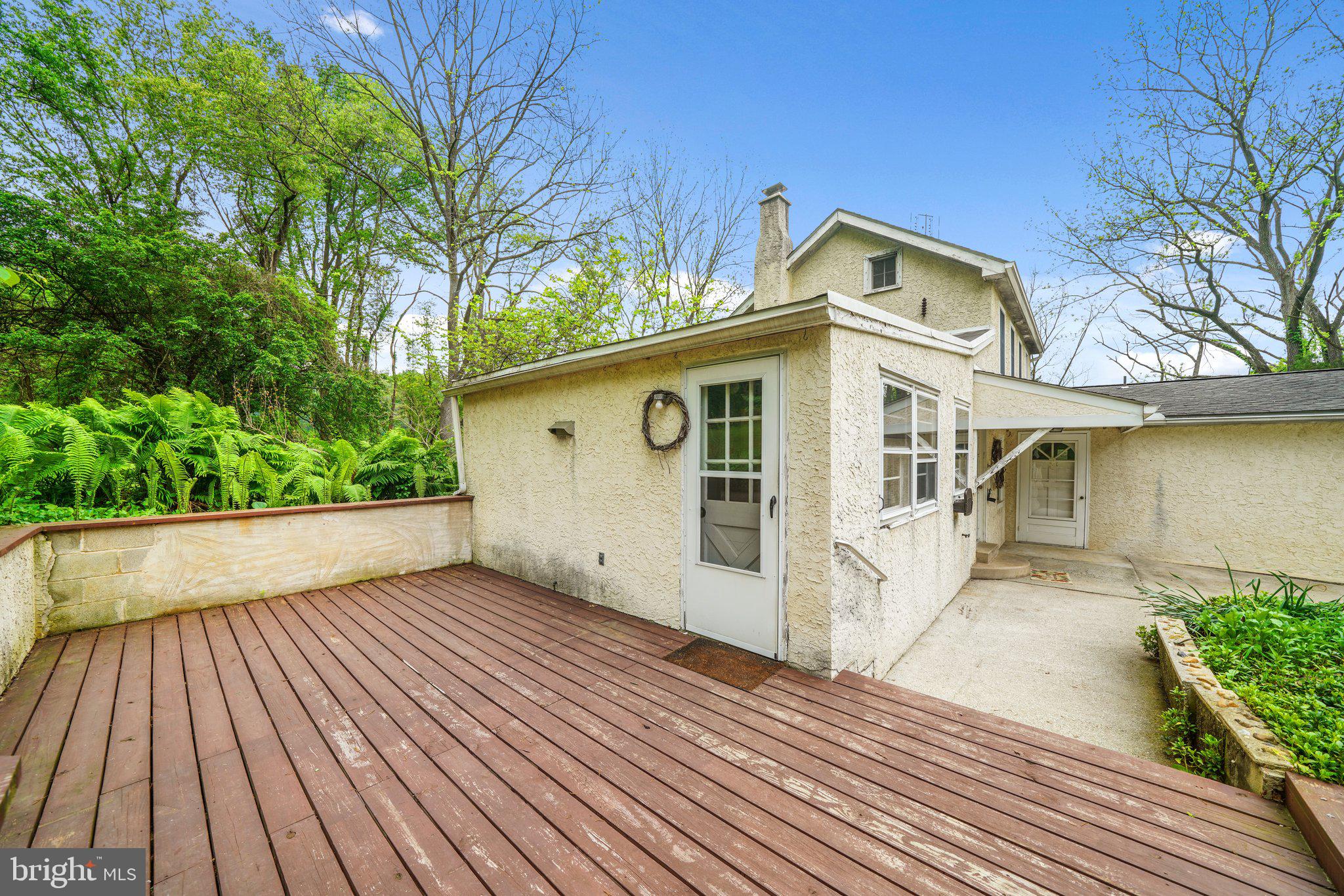 1046 Pike Springs Road Phoenixville, PA 19460 - Photo 26 of 51 Side Deck and Patio outside of kitchen