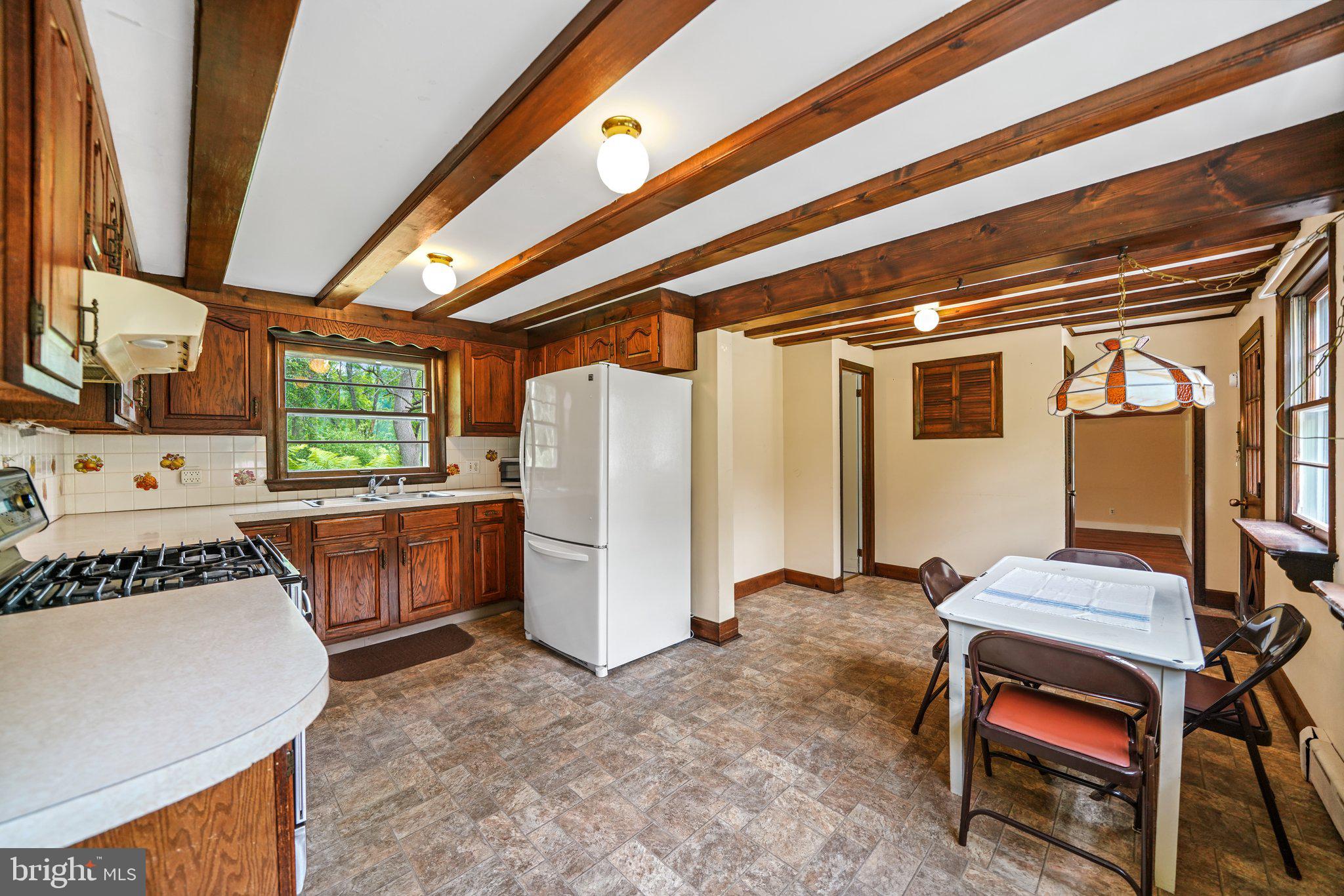 1046 Pike Springs Road Phoenixville, PA 19460 - Photo 27 of 51 Kitchen with exposed beams