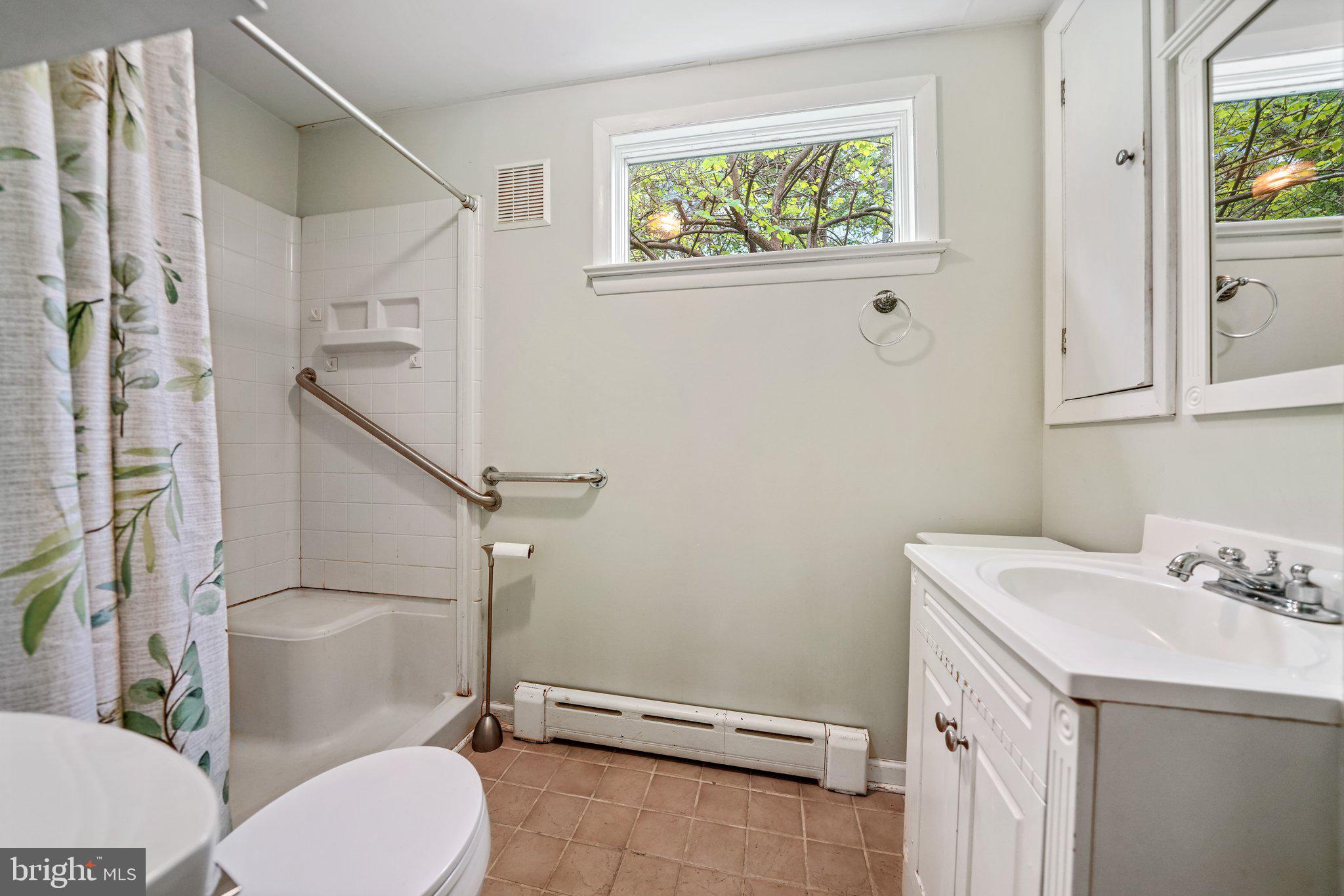 1046 Pike Springs Road Phoenixville, PA 19460 - Photo 32 of 51 Main floor full bath off of kitchen