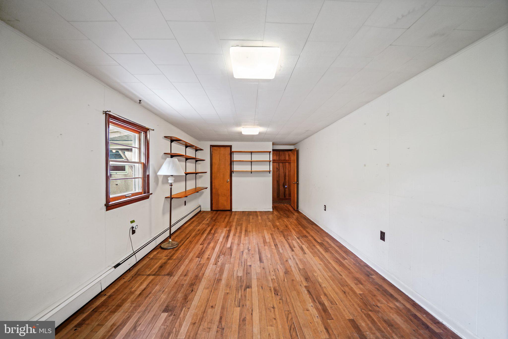 1046 Pike Springs Road Phoenixville, PA 19460 - Photo 40 of 51 Bedroom with wood floors