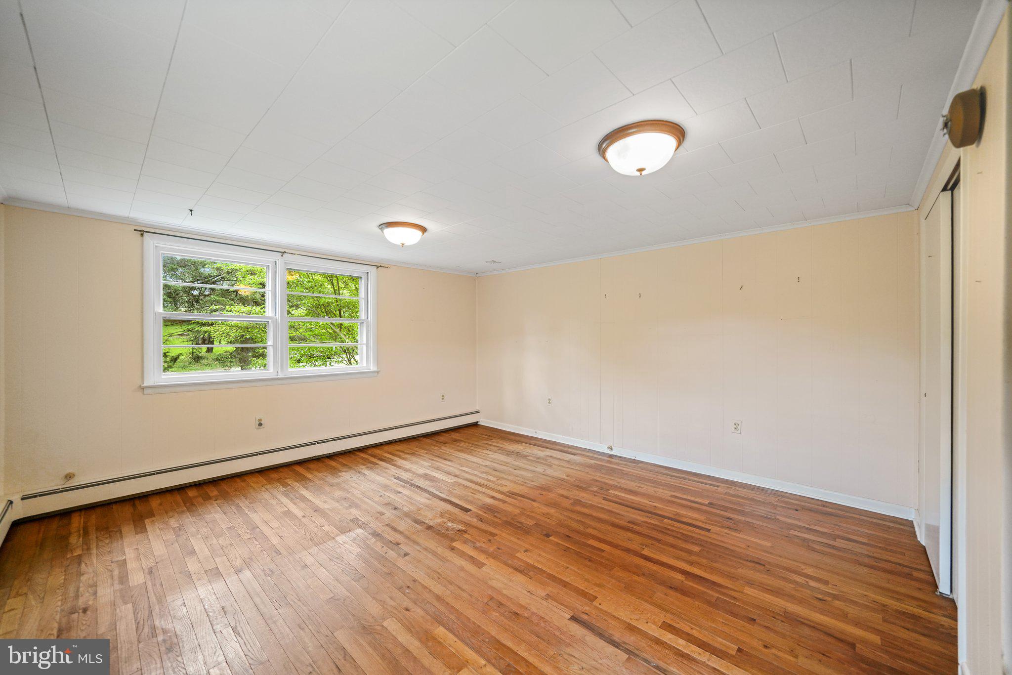 1046 Pike Springs Road Phoenixville, PA 19460 - Photo 42 of 51 Wood floors in main bedroom