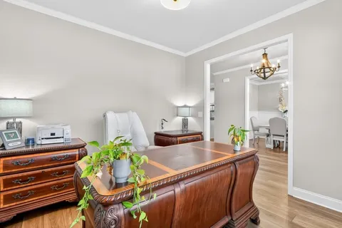 a room that has a table and chairs in it