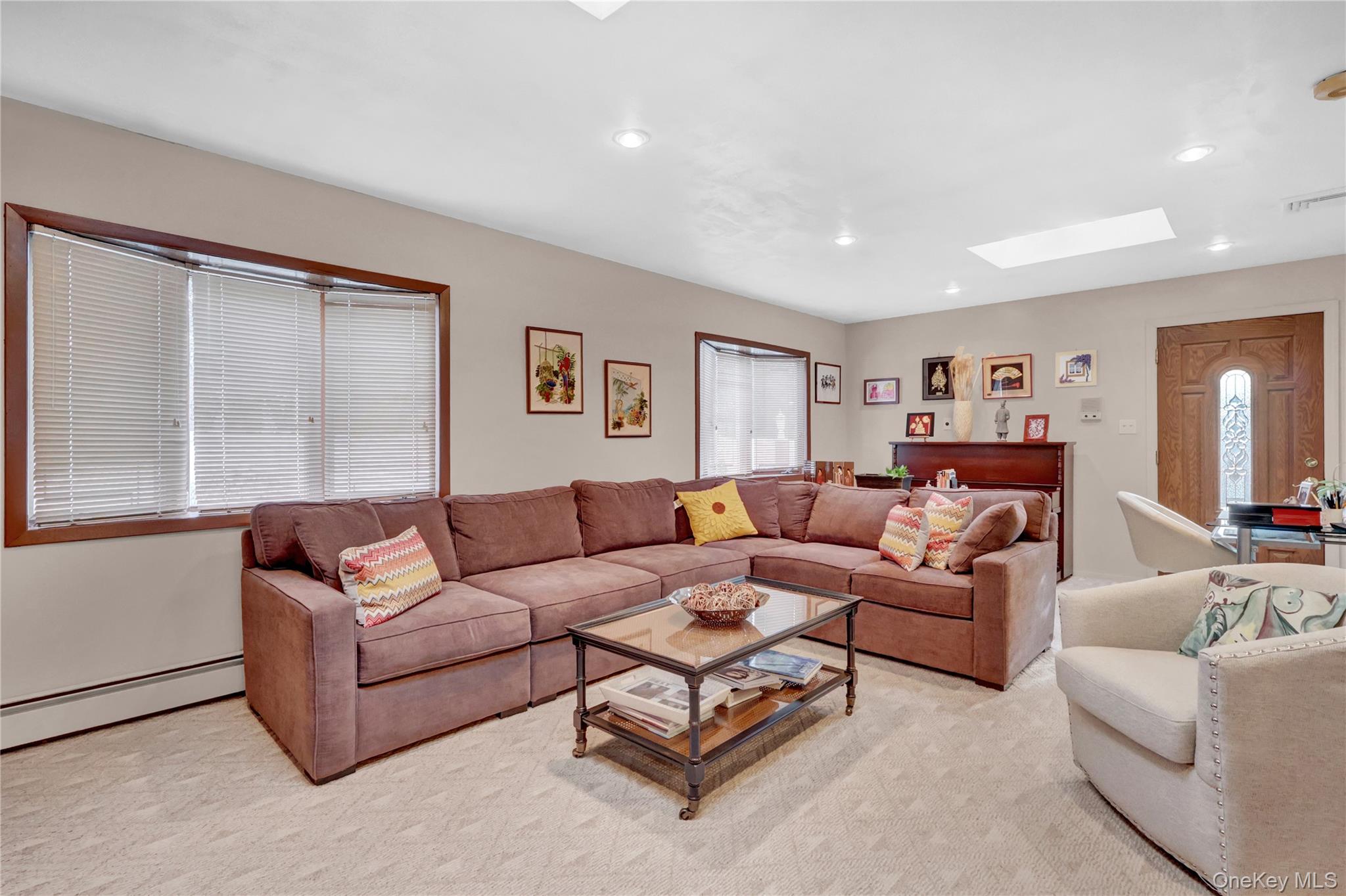 46 Kalda Lane Plainview, NY 11803 - Photo 20 of 30 a living room with furniture and a large window