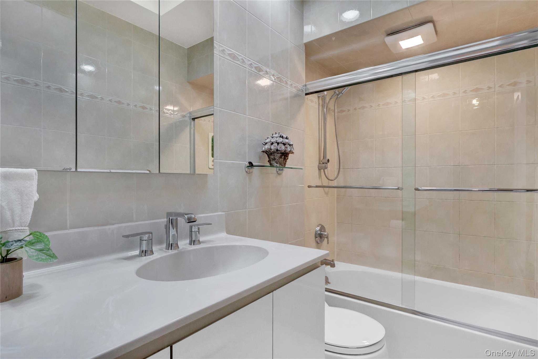 46 Kalda Lane Plainview, NY 11803 - Photo 24 of 30 a bathroom with a sink toilet and shower