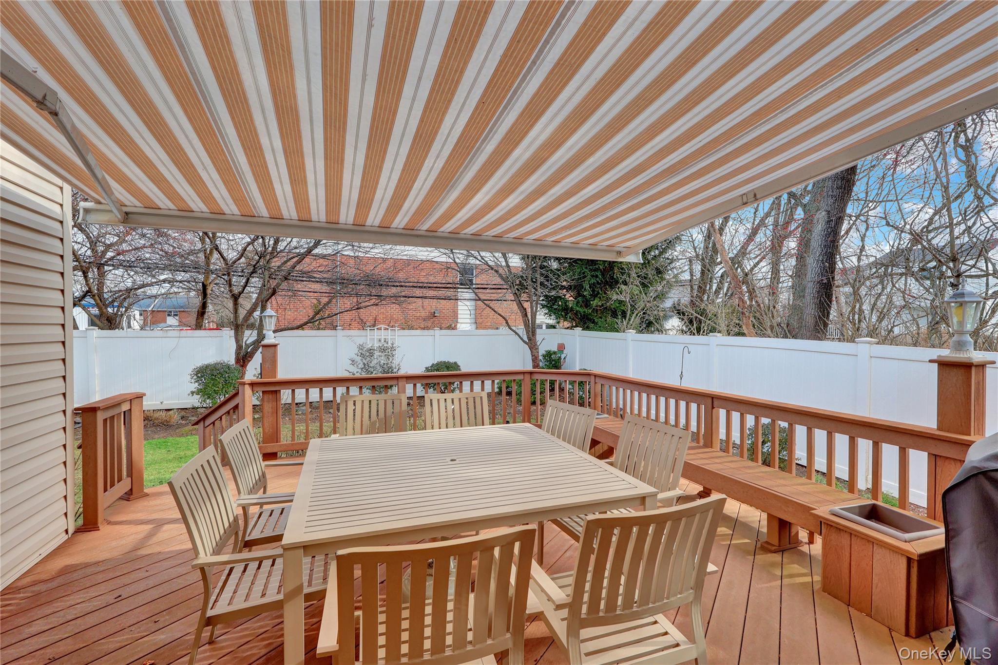 46 Kalda Lane Plainview, NY 11803 - Photo 30 of 30 a view of balcony with wooden floor and outdoor seating
