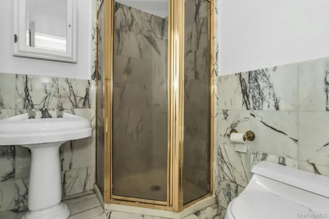 a bathroom with a sink and mirror